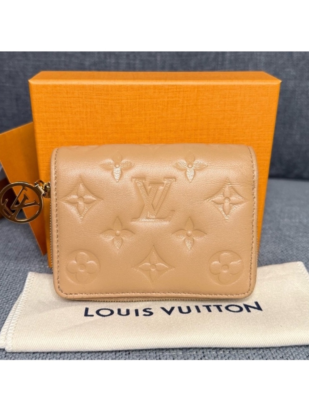 Louis Vuitton Lou (coussin) wallet monogram empreinte leather CAMEL